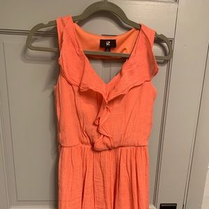 Long nice shirt color is between coral and salmon